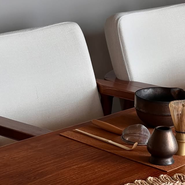 Matcha tools set out on a walnut table at The Timber Space
